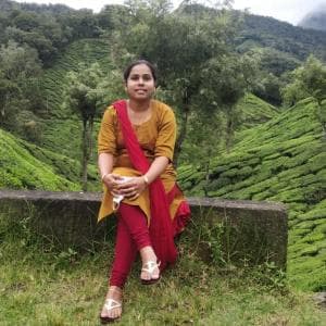 Reena Thomas Chemistry teacher,fluent in english